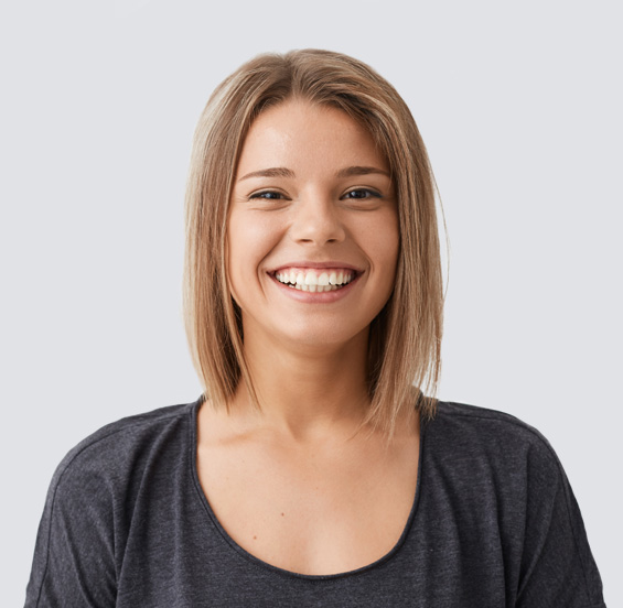 Woman in a grey top smiling